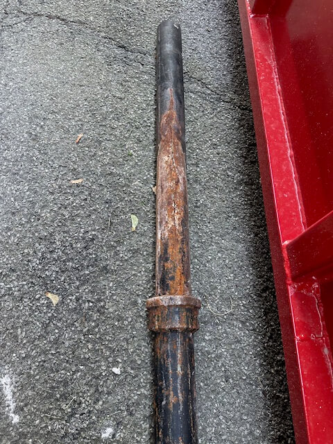 A 6 foot length of rusted and cracked cast iron drain pipe taken from a St. Catharines client home.